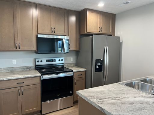 3 Bedroom 1.5 Bathroom Townhome – photo 1