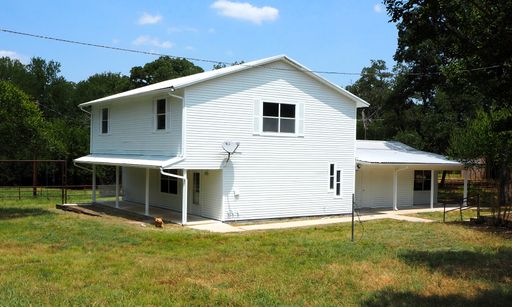 10 Acres in Aubrey with 2 Houses and Horse Barn – photo 1