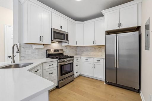Fabulously renovated 2-bedroom, 1.5-bath top-level penthouse just blocks from Reston Town Center and Reston Hospital – photo 1