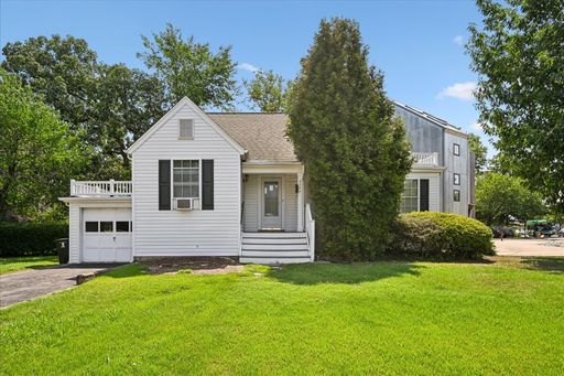 CHARMING CLARENDON HOME WITH A GARAGE, YARD, SUNROOM & TONS OF BONUS SPACE! – photo 1