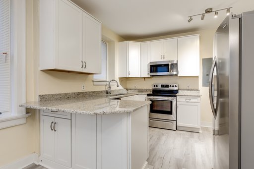 2 MONTHS FREE W/18-MONTH LEASE! Spacious Three-Bedroom Apartment on Monument Ave. $0.00 Upfront security deposit for qualified renters! – photo 1