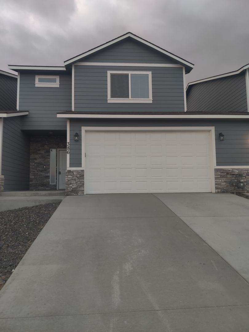 Contemporary Townhome with Open Floor Plan & Two-Car Garage