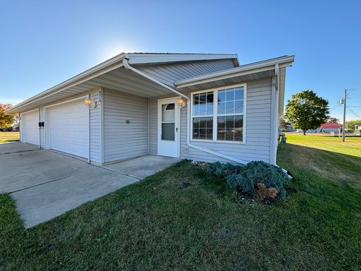 Spacious 2-Bedroom Home in Oconto with 2-Stall Attached Garage & Large Yard