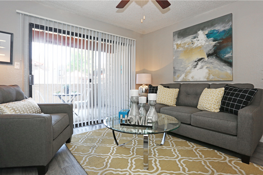Furnished apartment living area shown — representative home at Sanctuary on 22nd.