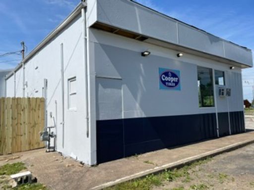 Commercial Space - Former Sutton Tire Center – photo 1