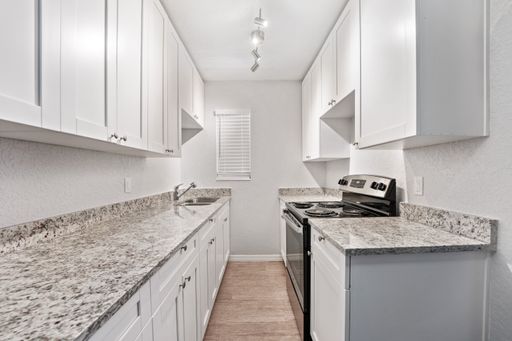 Fully Renovated, Downstairs Two Bedroom Apartment Home with Screened-in Patio – photo 1