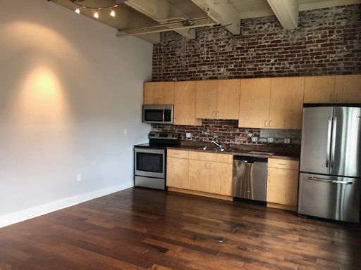 Large Industrial Style Corner 1-Bed With Tons Of Natural Light And Bonus Space! – photo 1