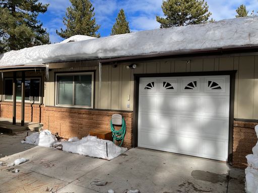 One level home with one car garage – photo 1