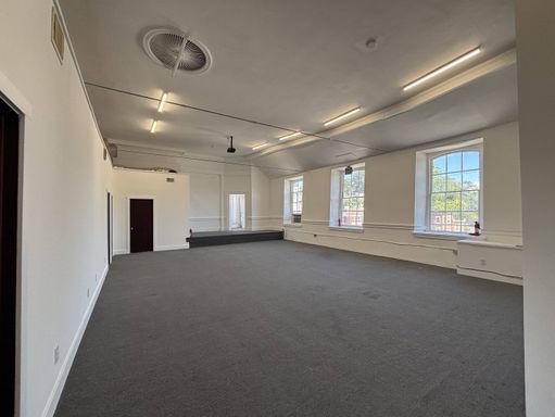 Third floor available in historic building with river views – photo 1