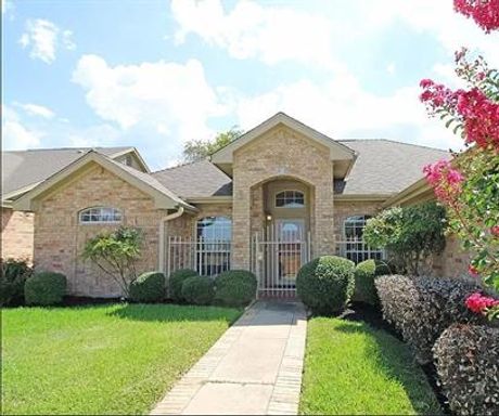 Convenience and style combine to create this spacious home ideally set on a corner lot in a great neighborhood. – photo 1