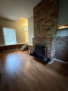 Private entry loft with wood burning fireplace – photo 1