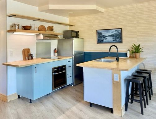 Large Studio Apartment with a Deck & Kitchen - Live, Work, Play! All Utilities & Internet included.