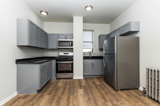 Large condo quality 1-bedroom, 1-bathroom unit with new rehab! No security deposit! Heat included! – photo 1