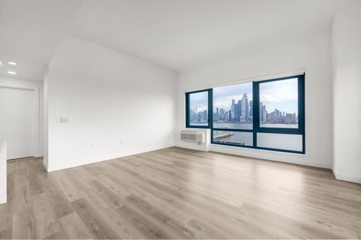 SPACIOUS TOP FLOOR 2/BEDROOM 2/BATH - DIRECT SOUTH - EAST NYC VIEWS - A+ WATERFRONT LOCATION – photo 1