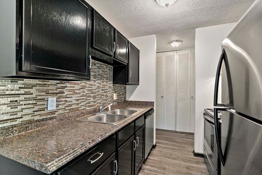 SMOKE FREE First Floor One Bedroom Apartment with vinyl flooring and walk out patio.