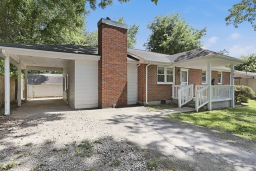 Available now. Brick ranch home at the end of a cul-de-sac!! Fenced in backyard, covered parking. – photo 1