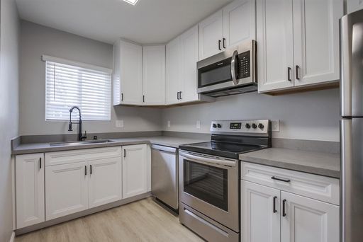 Newly renovated 1x1 in the heart of Pacific Beach! (a/c, w/d, & parking, balcony) – photo 1