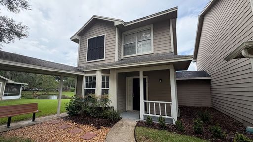 Spacious 2 Bed 2.5 Bath Home in East Orlando with Community Pool – photo 1