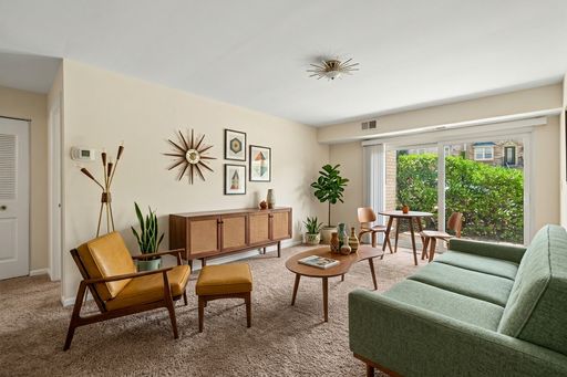 Move-In Ready 801 Sq/F Ground Floor Condo with Walk-Out Patio in Silver Spring – photo 1