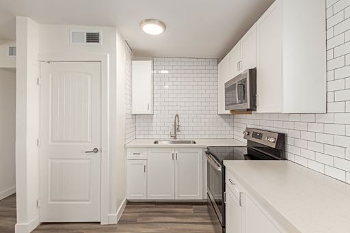 Apartment kitchen — representative home at Clarendon Arms.