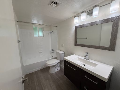 Apartment bathroom — representative home at Camelback Village.
