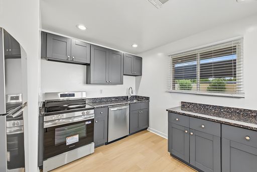 Apartment kitchen — representative home at 22nd Street Apartments — 3007.