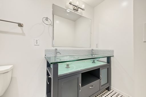 Apartment bathroom — representative home at 22nd Street Apartments — 3007.