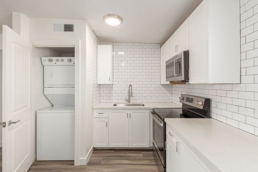 In-home laundry area — representative home at Clarendon Arms.