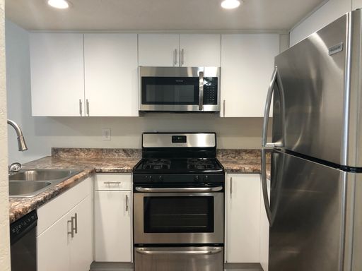 ONE MONTH OFF MOVE IN SPECIAL- Two-story 3 bedroom 2 bath townhouse with a Large attached garage with washer and dryer hookups. – photo 1