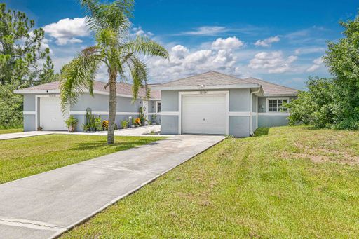 Well Maintained Duplex in Lehigh with 1 Car Garage! – photo 1