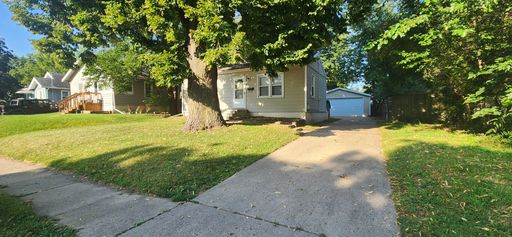 2 bedroom home with 2+ car garage and partially fenced, beautiful yard! – photo 1