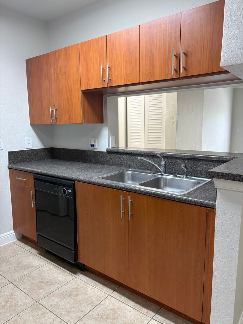 Coral Springs Apartment: 8703 W Sample Road, Apt. 101-211
