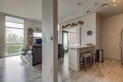 1 Bed/1 Bath Condo at 5th and Main, Assigned Parking, Washer/Dryer/Covered Balcony – photo 1