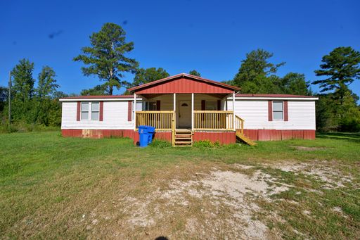 Beautifully Updated Double-Wide on a Large Lot! – photo 1
