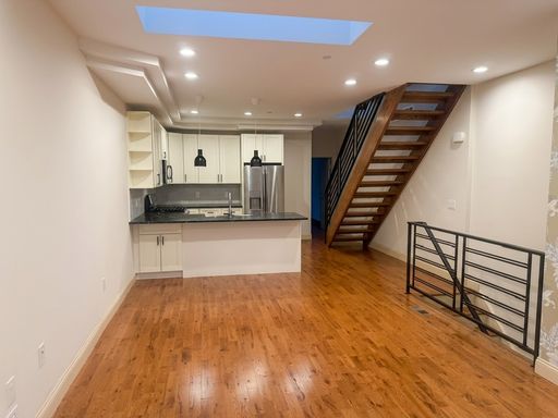 3-Bedroom, 3-Bath Home with Roof Deck and Enclosed Garage – photo 1