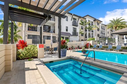 Luxury Living Meets Prime Location! Naples Square 2/2 Condo with Expansive Terrace – photo 1
