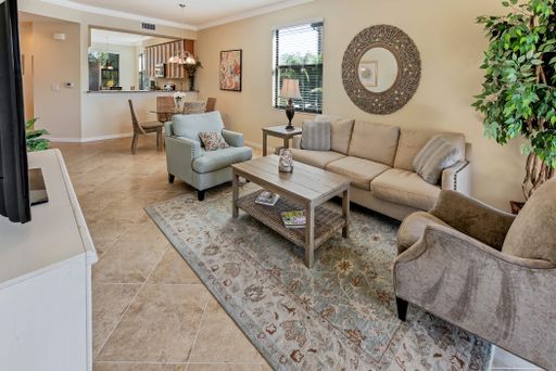 Available now as a turnkey furnished annual 2BR/2BA+Den Condo in Treviso Bay! – photo 1