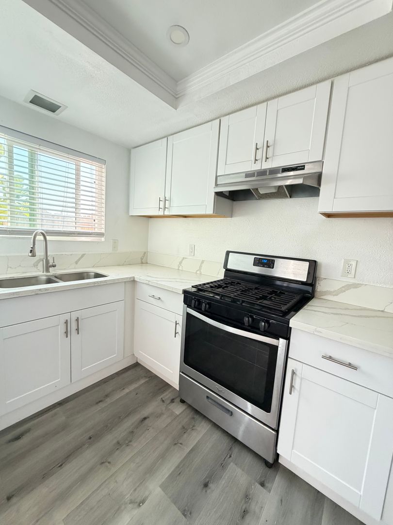 Fantastic & Modern Corner Unit w/ Private Patio 6 of 12
