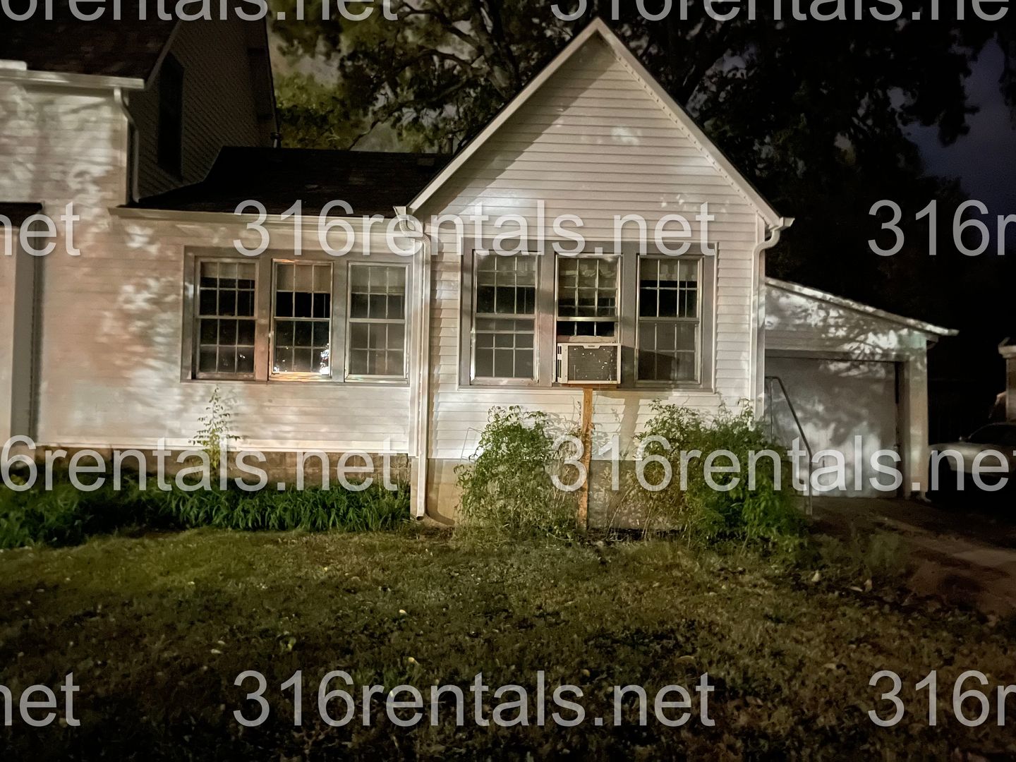 Newton Apartment: 1500 N Main St - 104 E 14th St