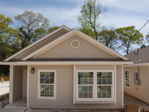 Beautiful 1 Story MOVE IN READY New Construction home in Lake Conroe Village Subdivision. This Gorgeous Open Floor Plan has 2 Bedrooms, 2 Baths. Front door with Glass Insert. Large Kitchen area with Granite counter tops and ample Kitchen Cabinets with S/S