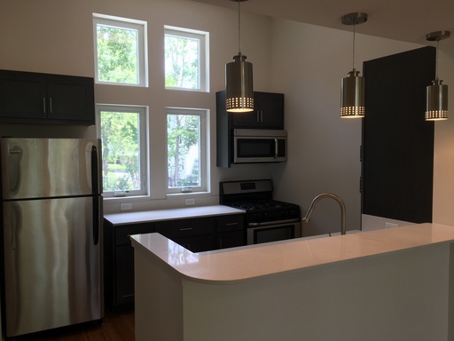 Exquisite Loft Located in Vibrant Van Wagner Place Neighborhood – photo 1