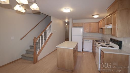 Large Townhouse with Attached Garage and Private Yard! – photo 1