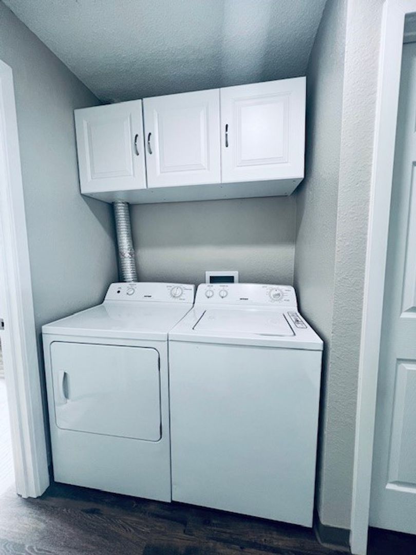 Laundry room at North Trace Village Apartments