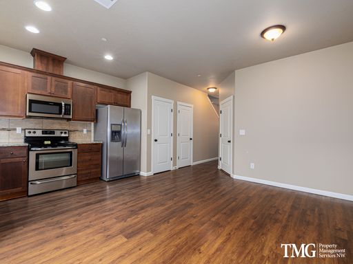 Modern Living with A/C and Attached Garage! $1000 Refundable Security Deposit – photo 1