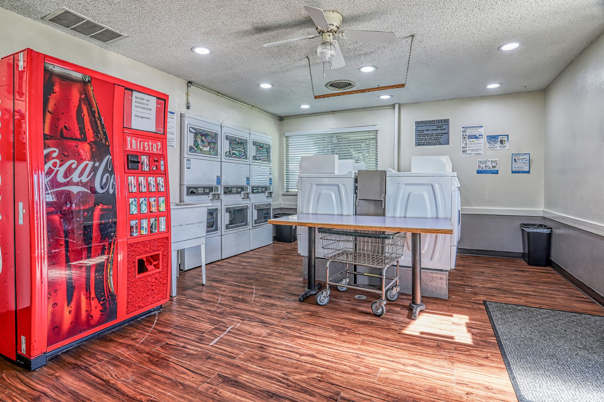 Laundry room at Pepper Tree Village Apartments (2 of 2)