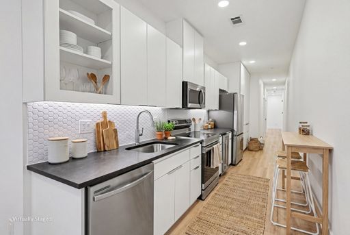 Two (2) months free with 15 month lease! Be the first to live in Unit 101 at 2217 Fitzhugh—a brand-new 2026 construction offering 712 sq ft of thoughtfully designed living space. This unique ground-floor residence is the only unit in the community featuri – photo 1