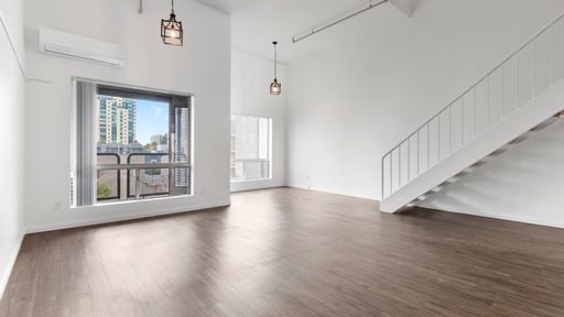 Stunning Downtown Loft with Parking and AC! – photo 1