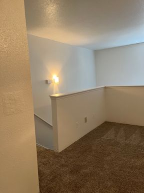 One bedroom, one and a 1/2 bathroom loft-style townhome – photo 1