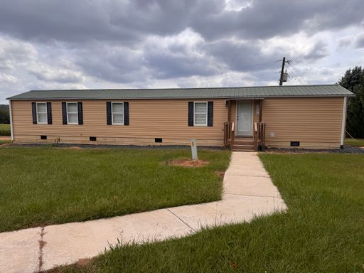 2 Bed, 2 Bath Mobile Home Located In The Country In Denton! With Beautiful Back Porch View! Lawn Care Included! – photo 1