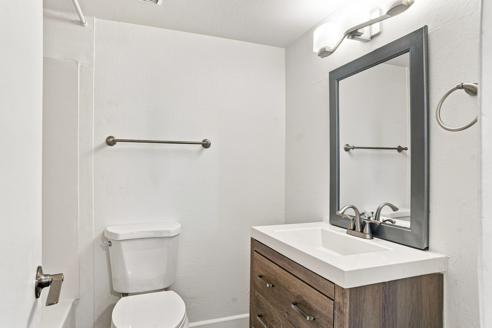 Apartment bathroom — representative home at The Element.